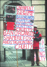 Tom Hardiman with placards
